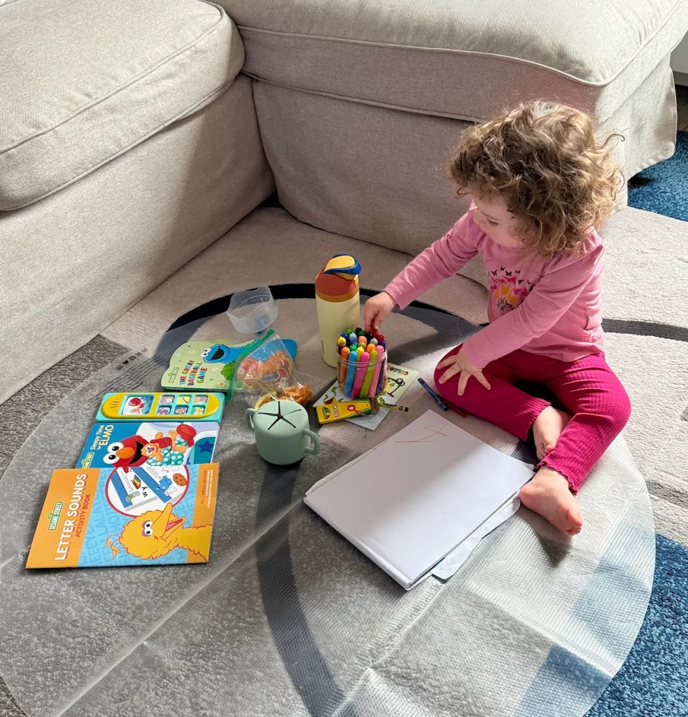 Kid engaging in interactive tons and reading in a Transformative Nanny Techniques.