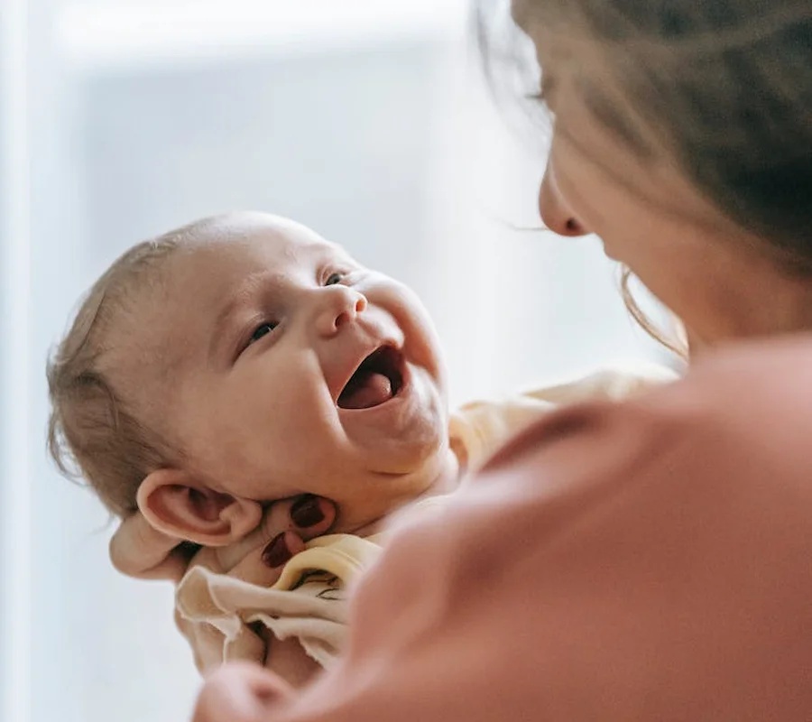 Talking to your baby at the Beach helps infant brain.