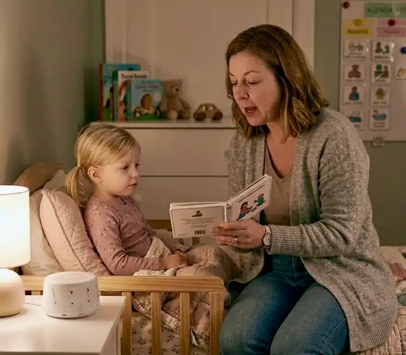 autistic child sleep routine bedtime reading with parent